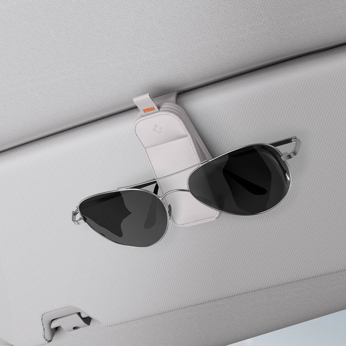 ACP08827 - Visor Leather Sunglass Holder SH101 in Gray showing the front, with sunglasses attached