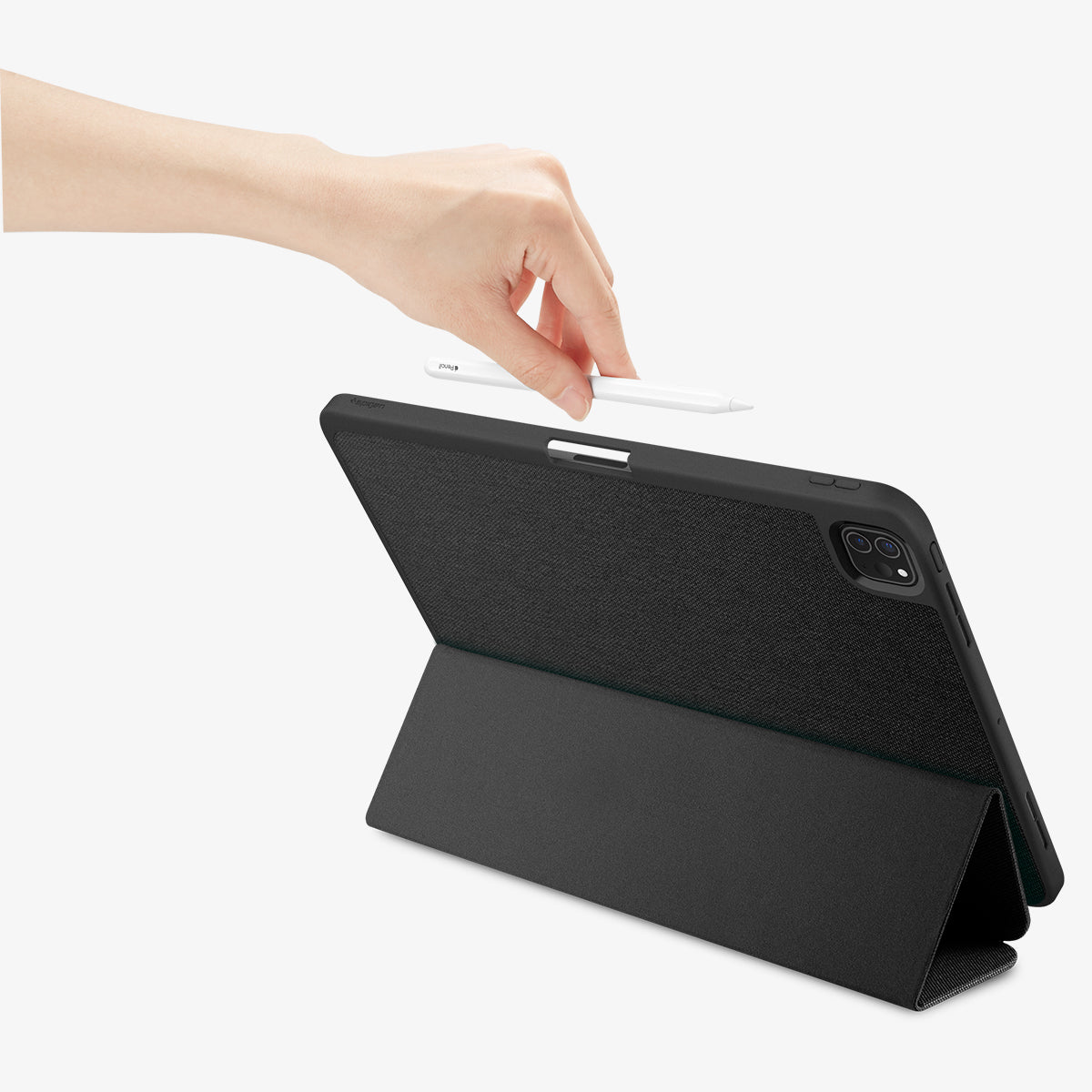 ACS07010 - iPad Pro 12.9-inch Case Urban Fit in Black showing the back, with a folded front cover propped up as a stand while a hand holding a stylus pen