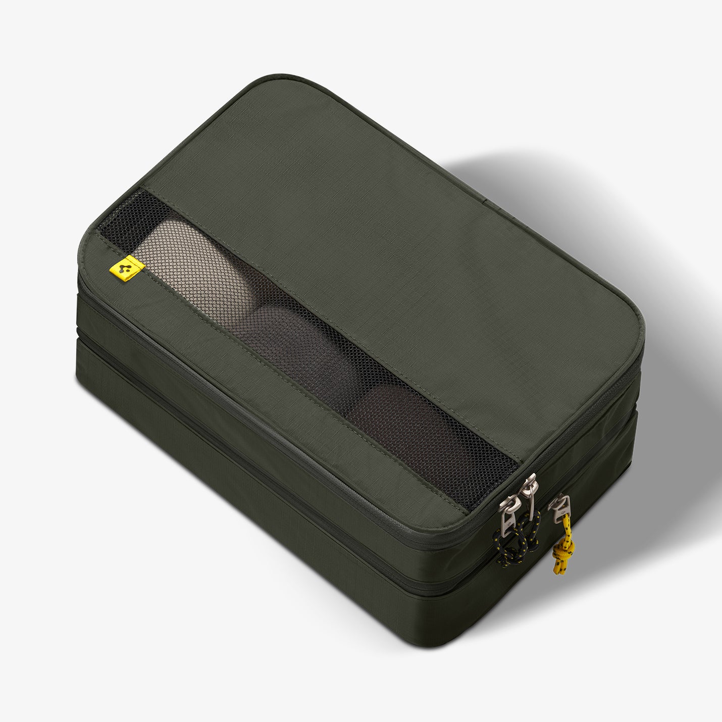 AFA08477 - Travel Packing Cubes KD600 small size in Hunter Green showing the front and partial side with things inside the bag