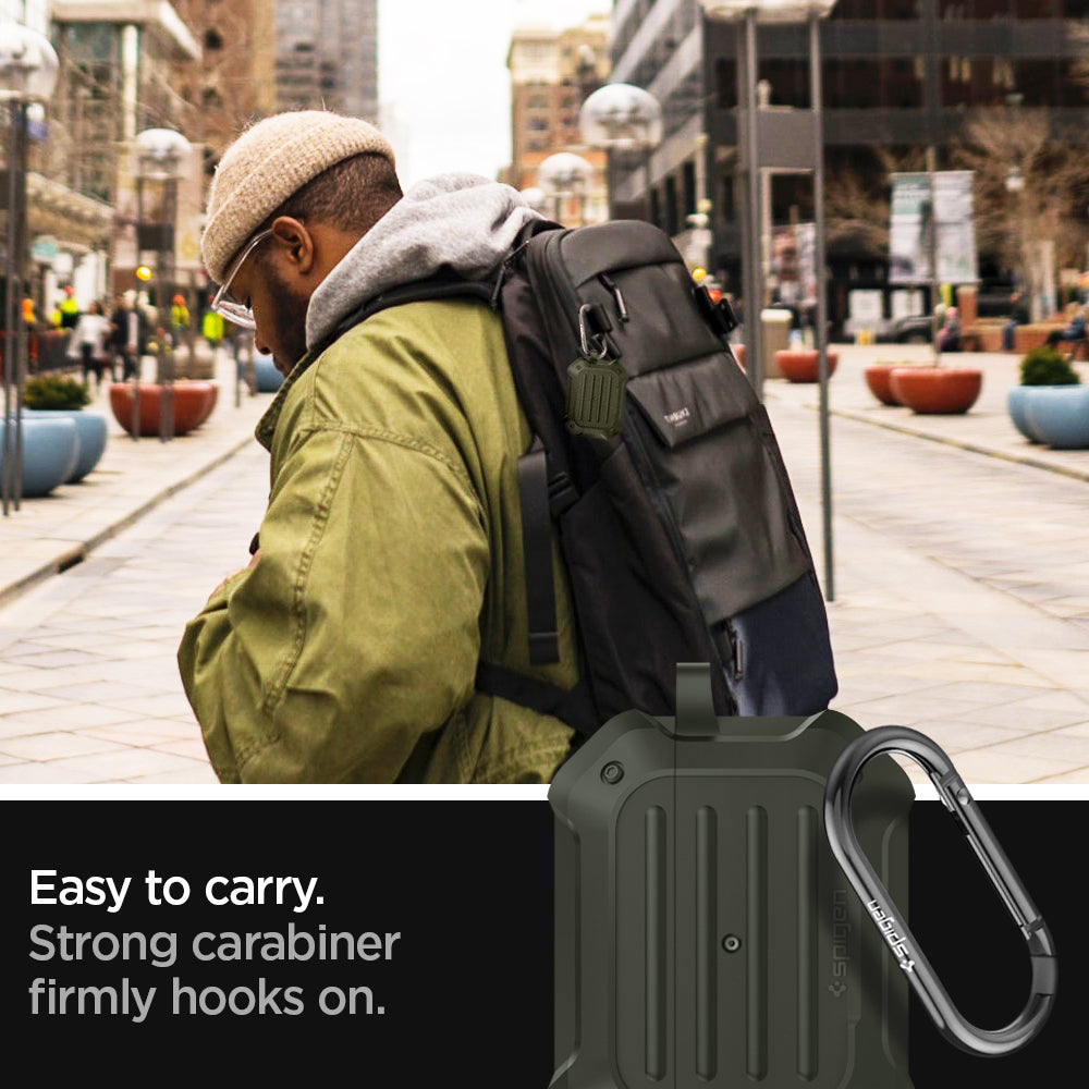 ASD00539 - Apple AirPods Pro Case Tough Armor in military green showing how it is easy to carry. Strong carabiner firmly hooks on