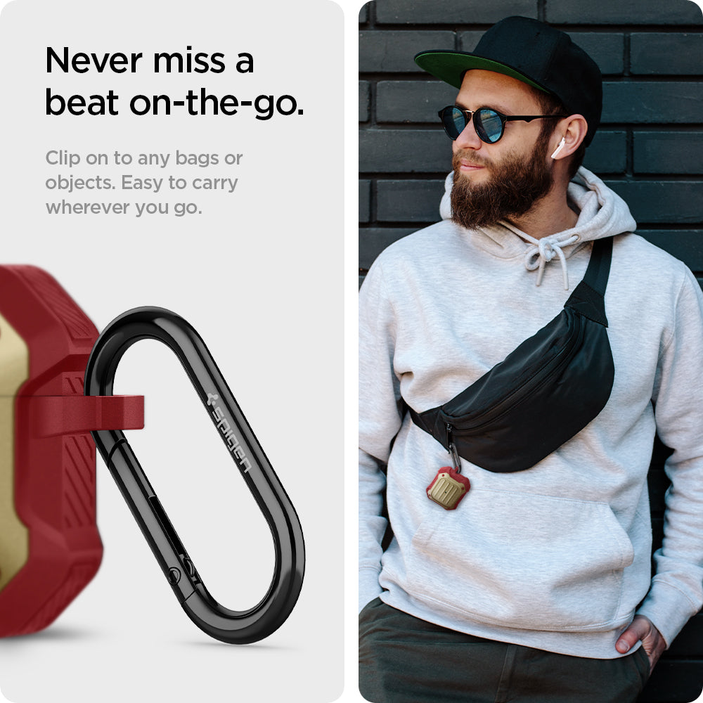 ASD02997 - Apple AirPods 3 Case Tough Armor in metallic gold showing the never miss a beat on-the-go. Clip on to any bags or a objects. Easy to carry wherever you go