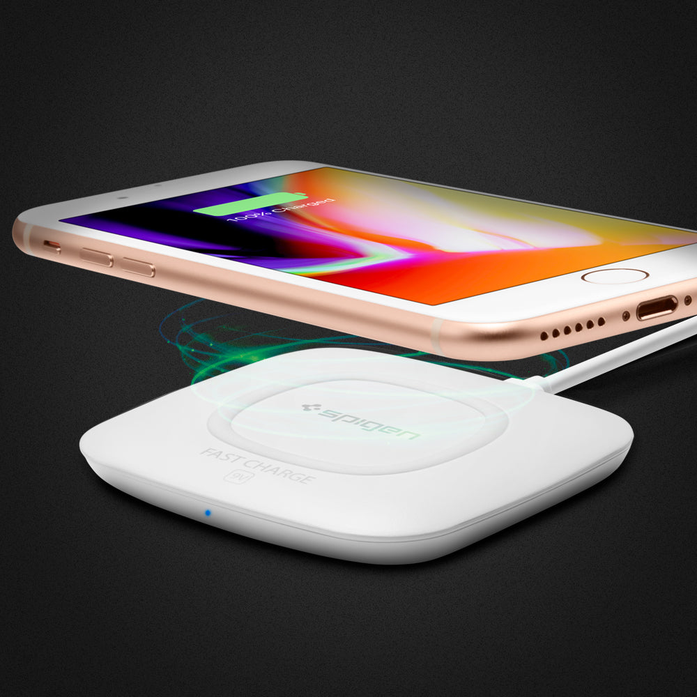 000CH22588 - Essential® 10W Wireless Charger F301W in White showing the device hovering above the wireless charger