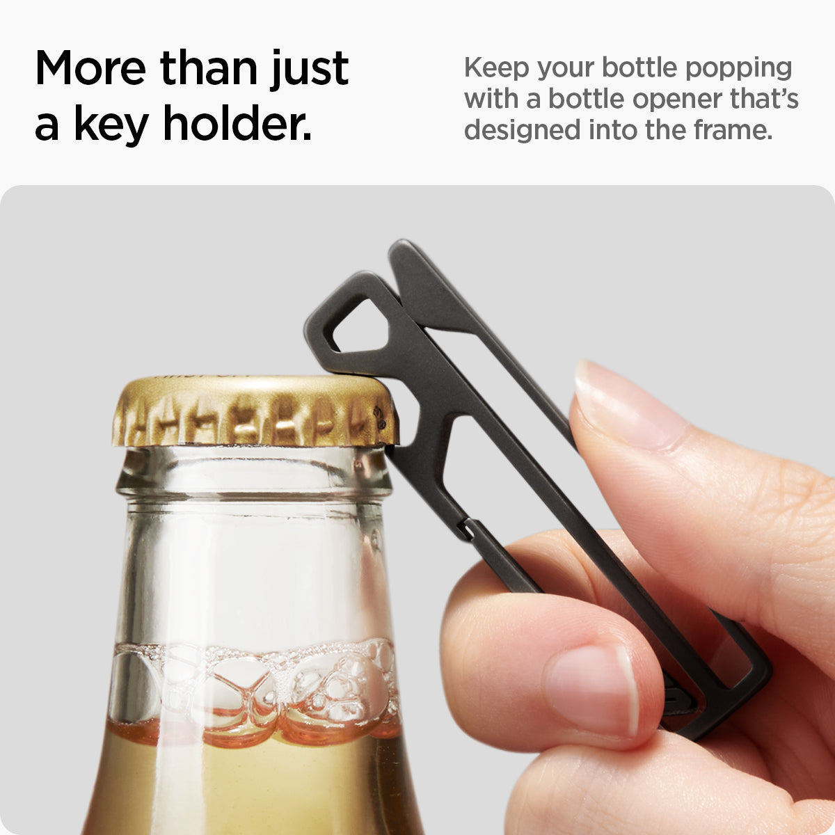 AHP05318 - Key Holder Clip Metal Fit in black showing more than just a key holder, keep your bottle popping with a bottle opener that's designed into the frame