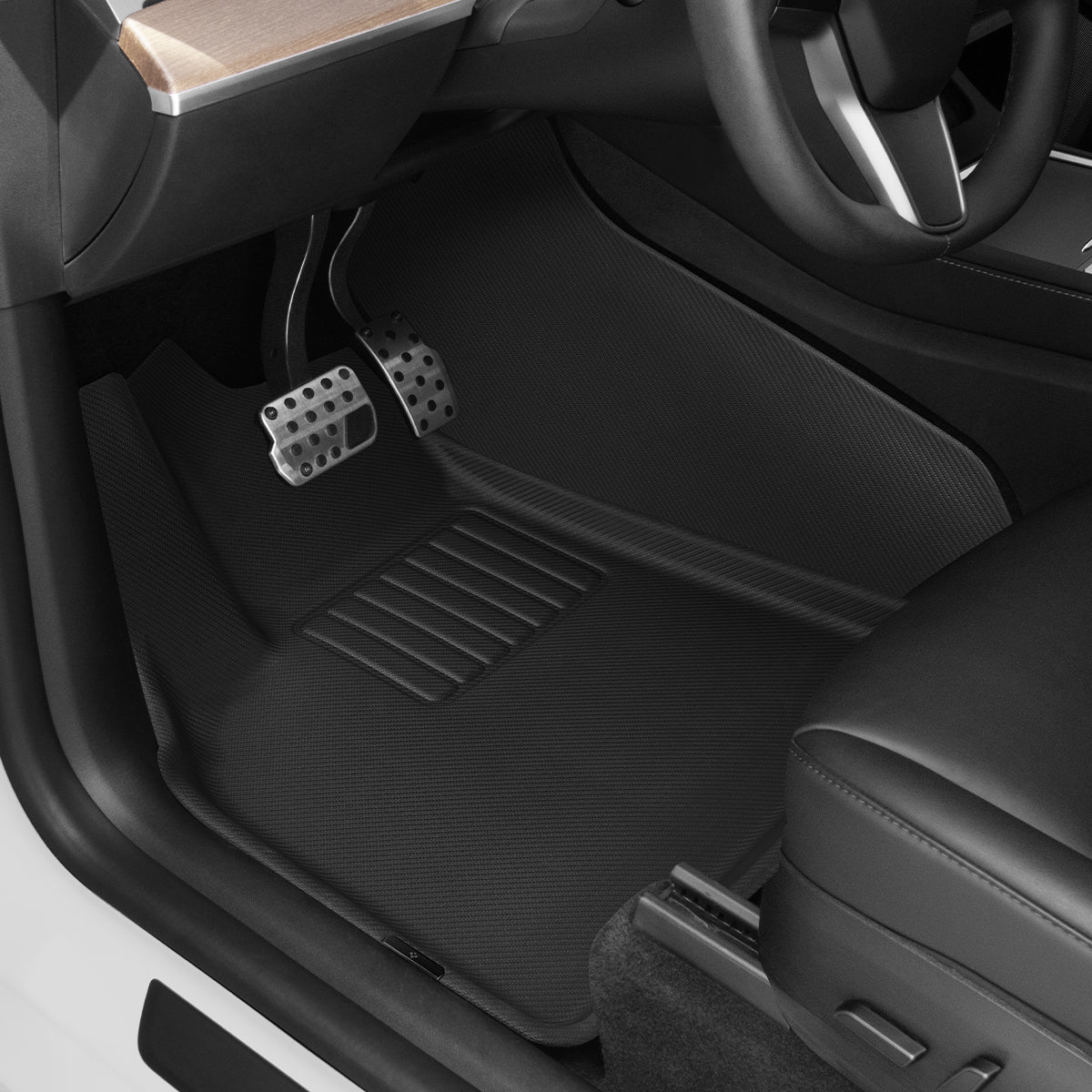 ACP07579 - Tesla Model Y WeatherBloc Floor Mat TLF-Y in Black showing the floor mat installed in the driver's car seat floor