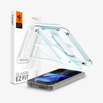 AGL07873 - Pixel 9 Pro Fold GLAS.tR EZ Fit in Clear showing the installation tray hovering above the 2 screen protectors and the device beside it is the packaging