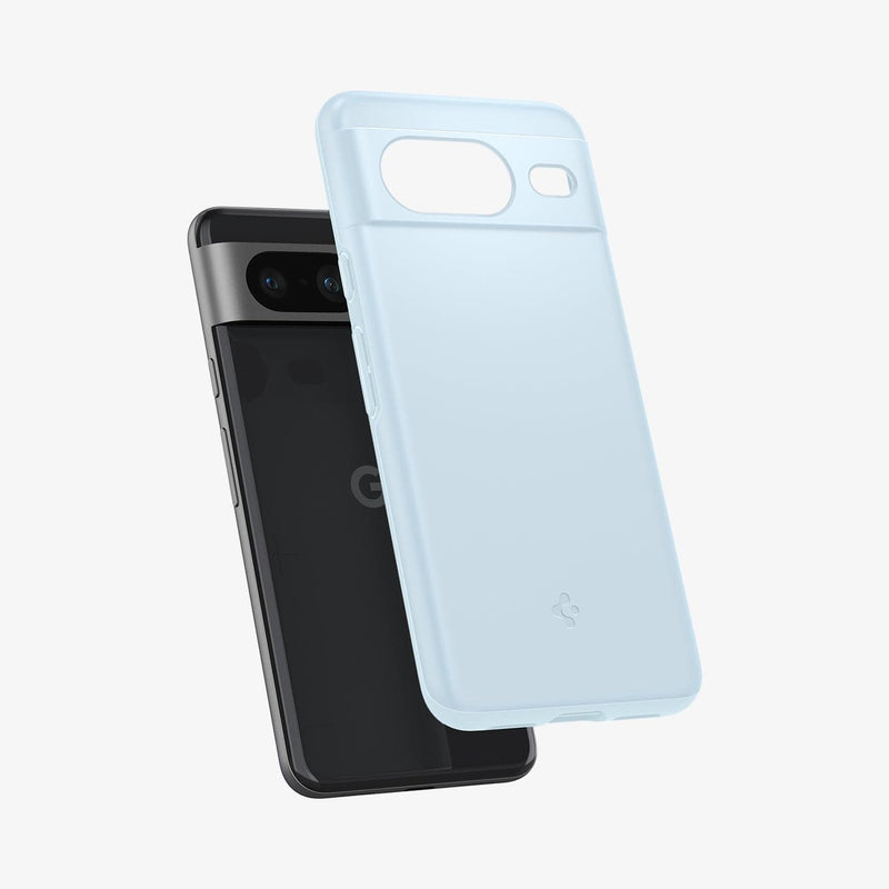 ACS06290 - Pixel 8 Case Thin Fit in mute blue showing the back with case hovering away from device